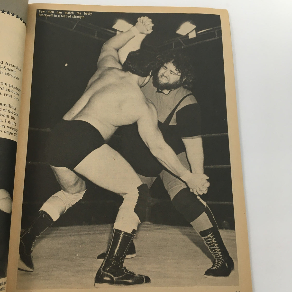 Wrestling Superstars Magazine Fall 1982 features Rick Martel in a wrestling match demonstrating strength against his opponent. A captivating moment showcasing wrestling techniques and the physicality of the sport.