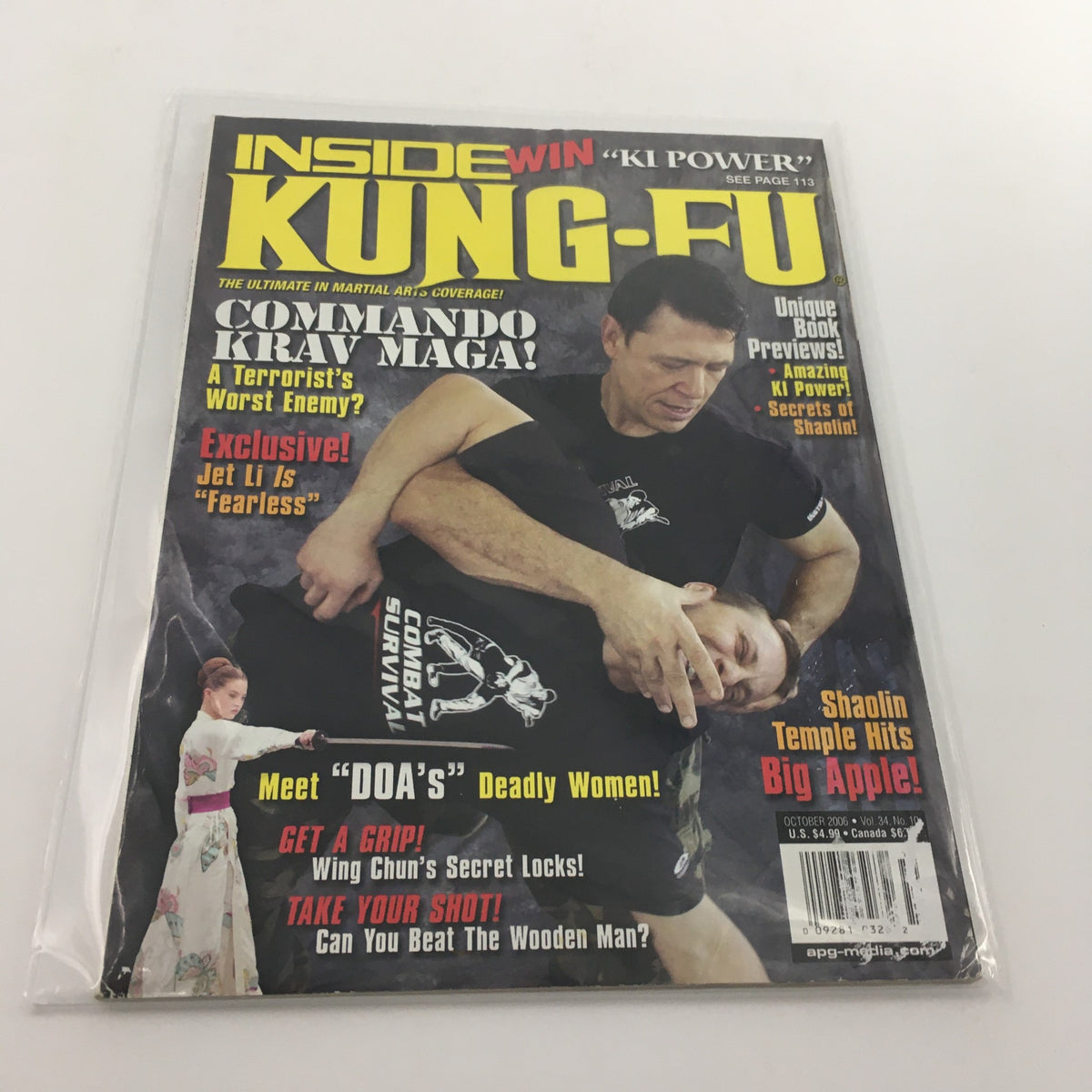 Inside Kung-Fu Magazine October 2006 cover featuring Krav Maga, with a dramatic photo of a martial arts demonstration, highlighting key topics like Commando Krav Maga and exclusive features on 'DOA' film.