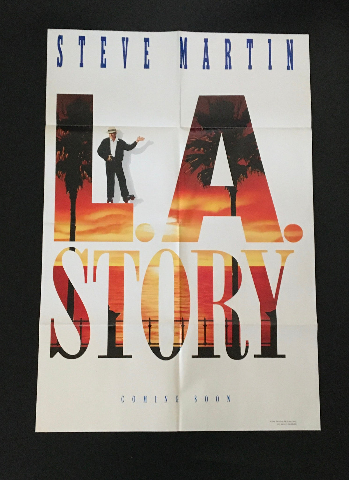 1990 L.A. Story 40" x 27" Original Movie Poster featuring Steve Martin standing next to the iconic title, showcasing a sunset backdrop and tropical palm trees.