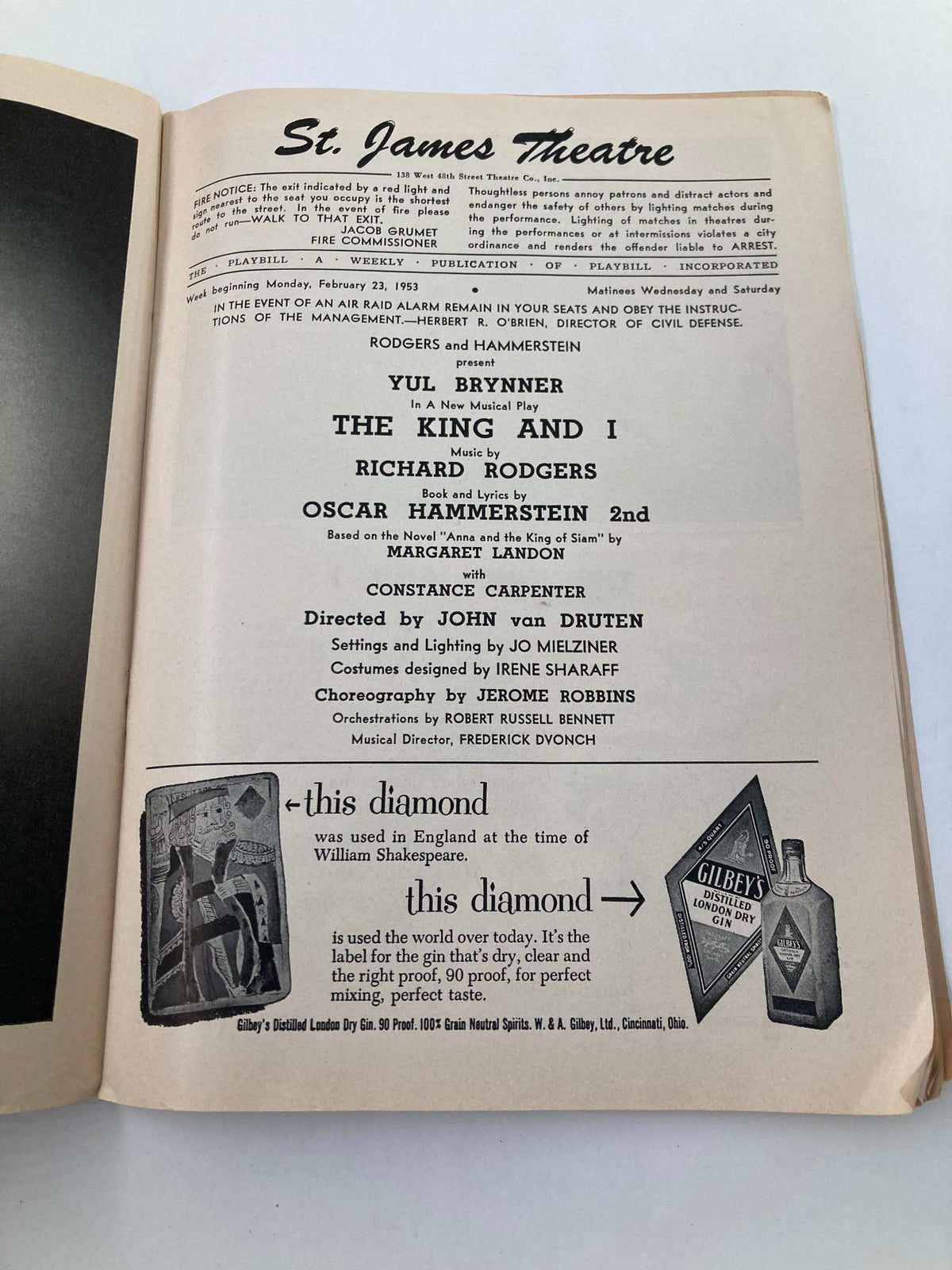 Inside page of the 1953 Playbill from St. James Theatre, featuring Yul Brynner in The King and I by John van Druten, displaying cast details and production information.