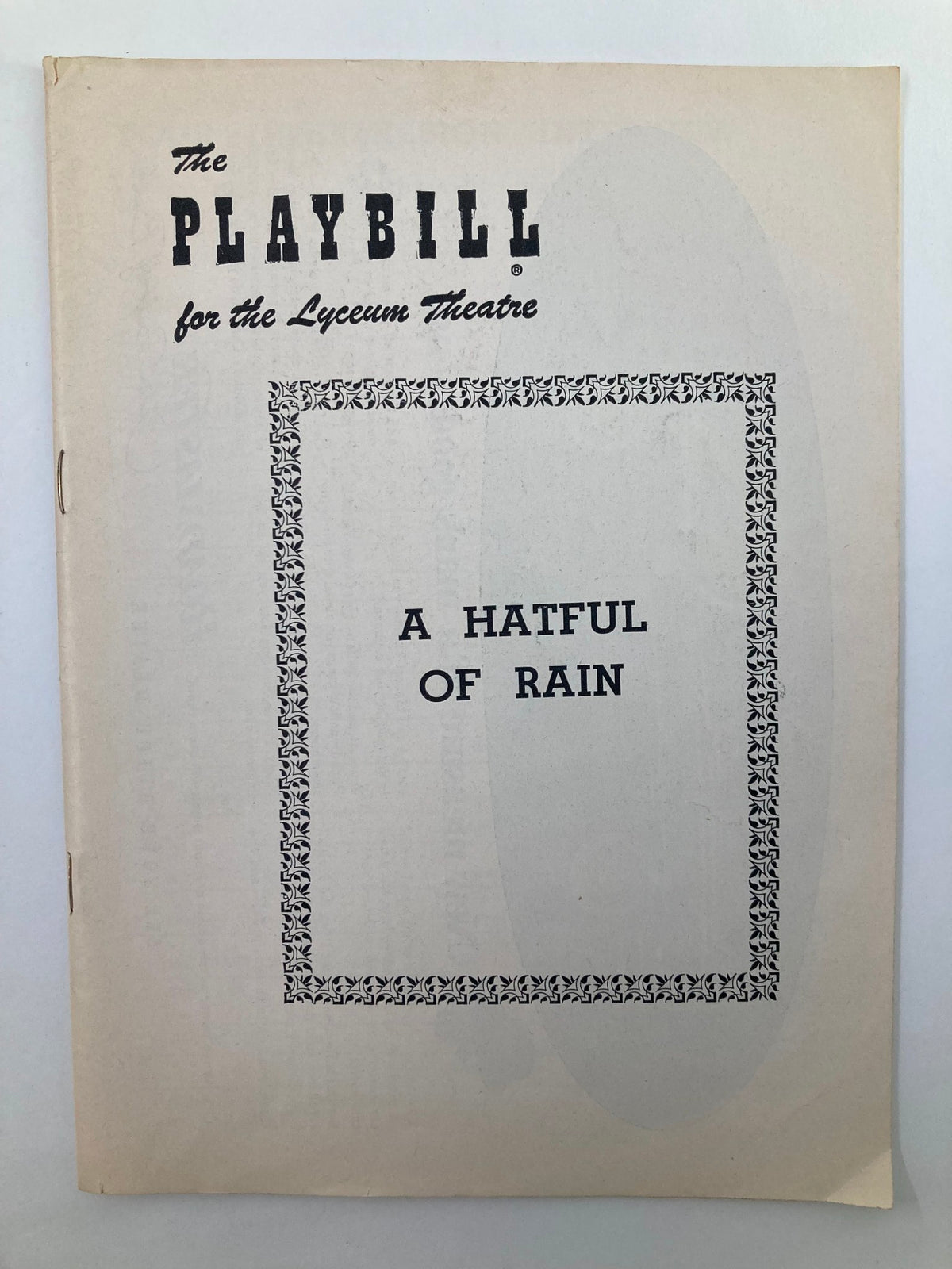 1956 Playbill for the Lyceum Theatre featuring 'A Hatful of Rain', highlighting the show title in a classic design.