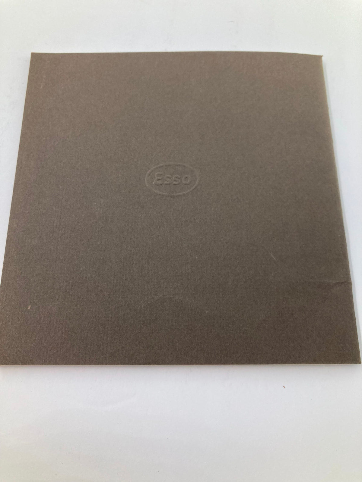 Back cover of the 1963 Souvenir Program Festival of Performing Arts featuring Hephzibah Menuhin, showcasing a simple brown design with ESSO logo.