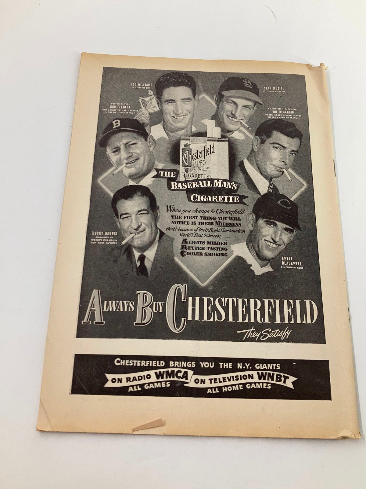 1948 advertisement page from the Program Magazine promoting Chesterfield cigarettes with illustrations of baseball players and a catchy slogan.