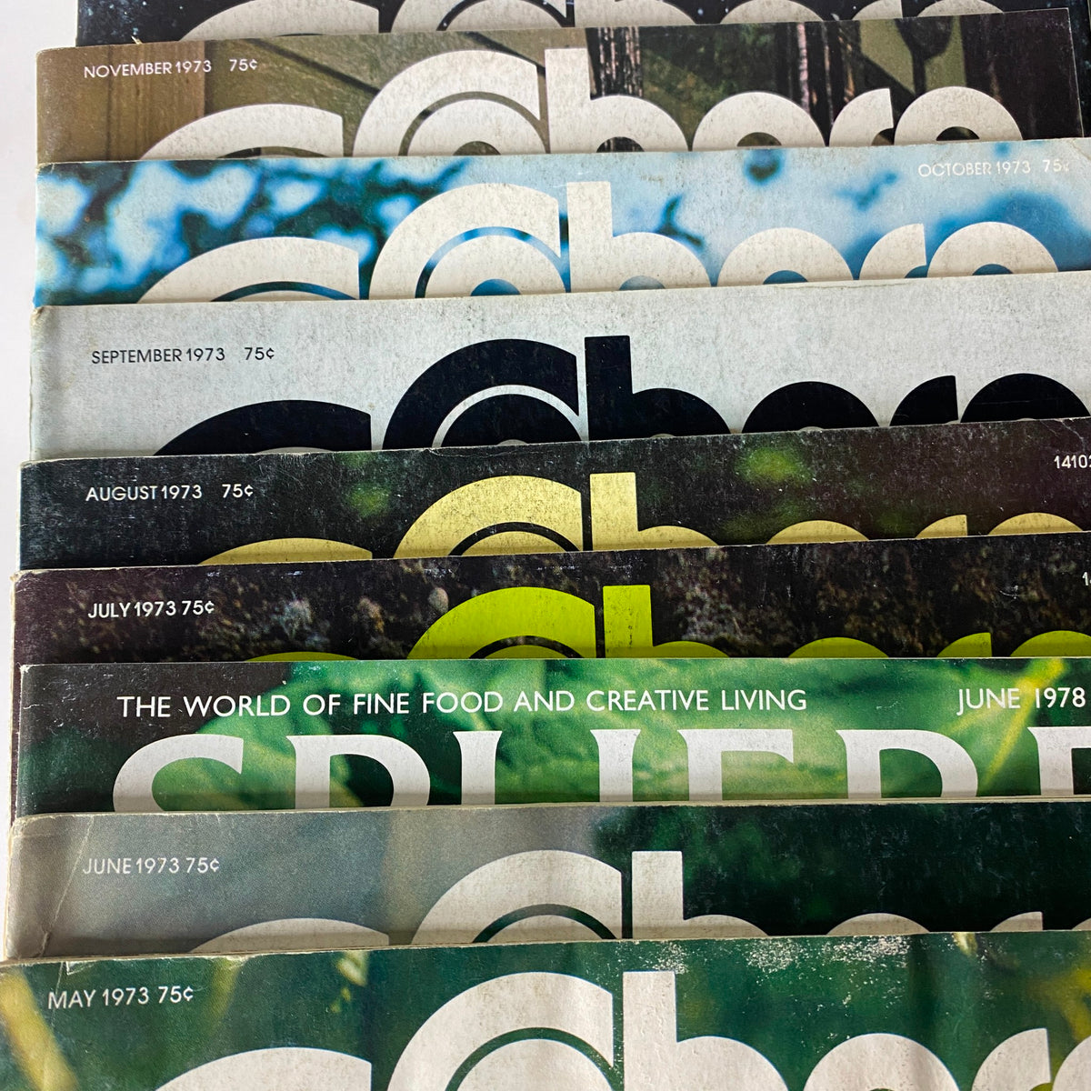 Vintage collection of Betty Crocker Sphere magazines from 1973 and 1978, showcasing covers with titles and prices. Ideal for collectors of culinary history.