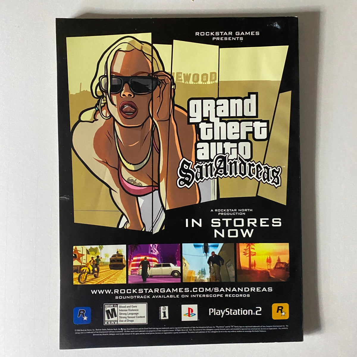 Advertisement for Grand Theft Auto: San Andreas featured in Revolver Magazine March 2005 Dimebag Darrell Cover, promoting the game available on PlayStation 2, enhancing the magazine's connection to pop culture.