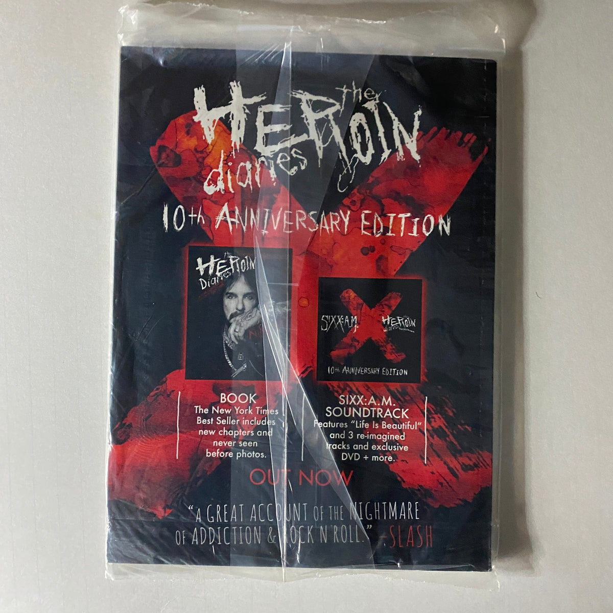 Back cover of The Heroin Diaries 10th Anniversary Edition, showcasing promotional details and images associated with the book.