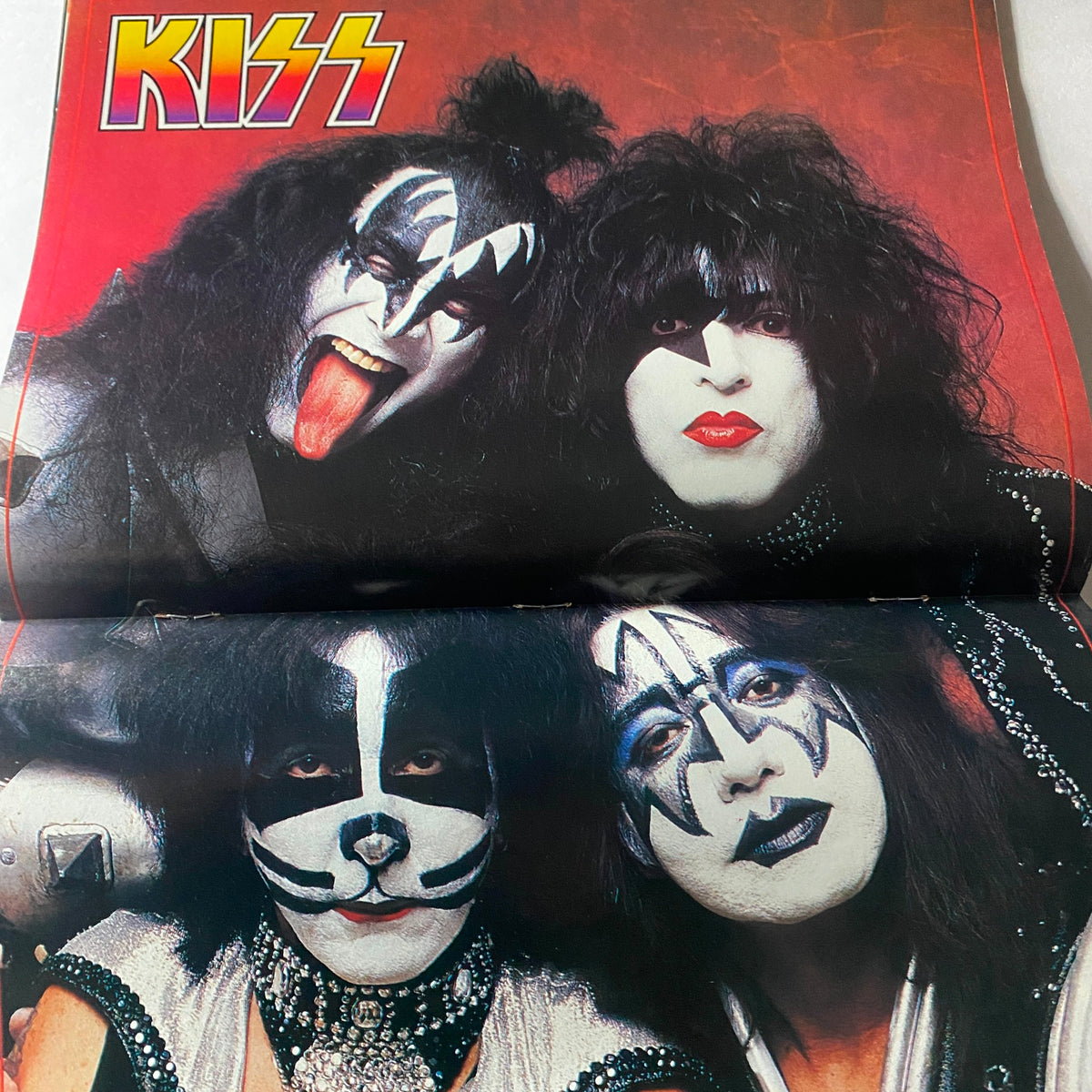 Centerfold poster of Kiss featured in the November 1998 issue of Hit Parader Magazine, showcasing the iconic rock band's striking makeup and costumes.