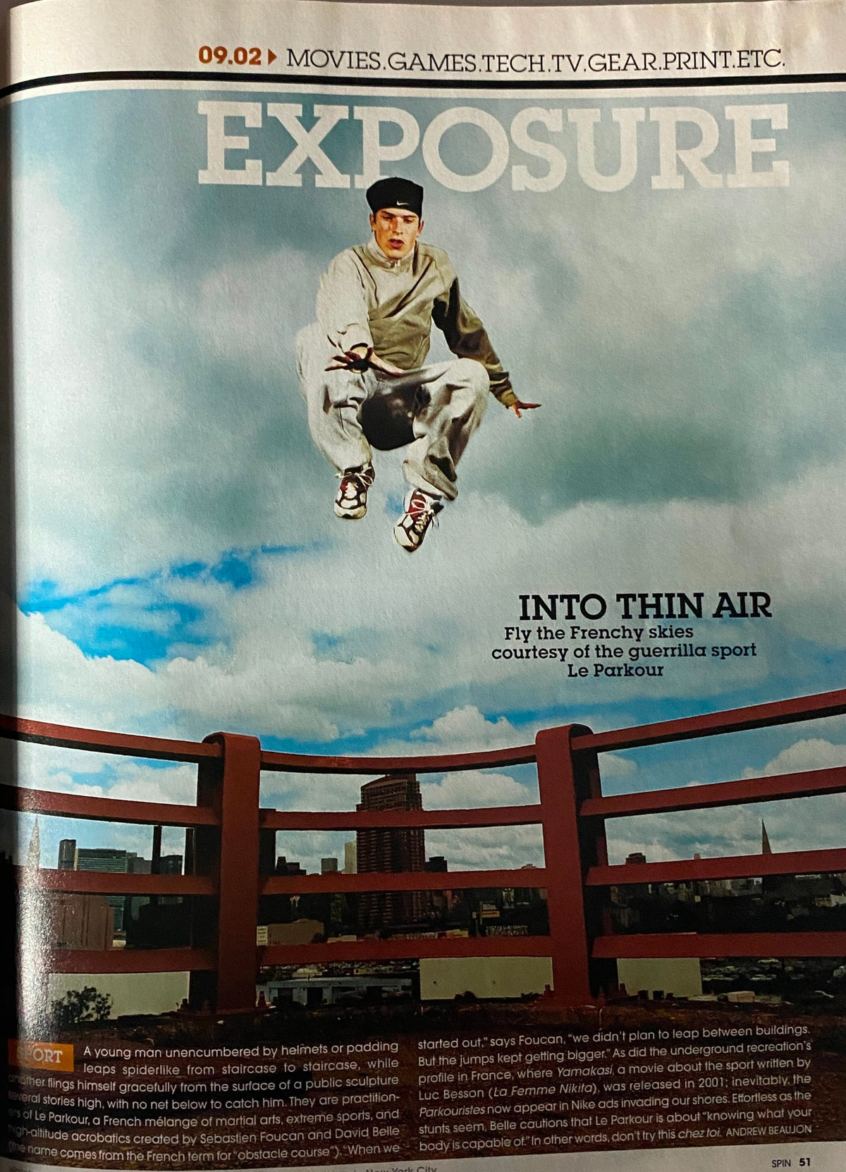 An interior page from Spin Magazine September 2002, highlighting an article on parkour titled 'Into Thin Air'. The image features a leaping figure showcasing the dynamic movement and energy that embodies the adventurous spirit of early 2000s culture.