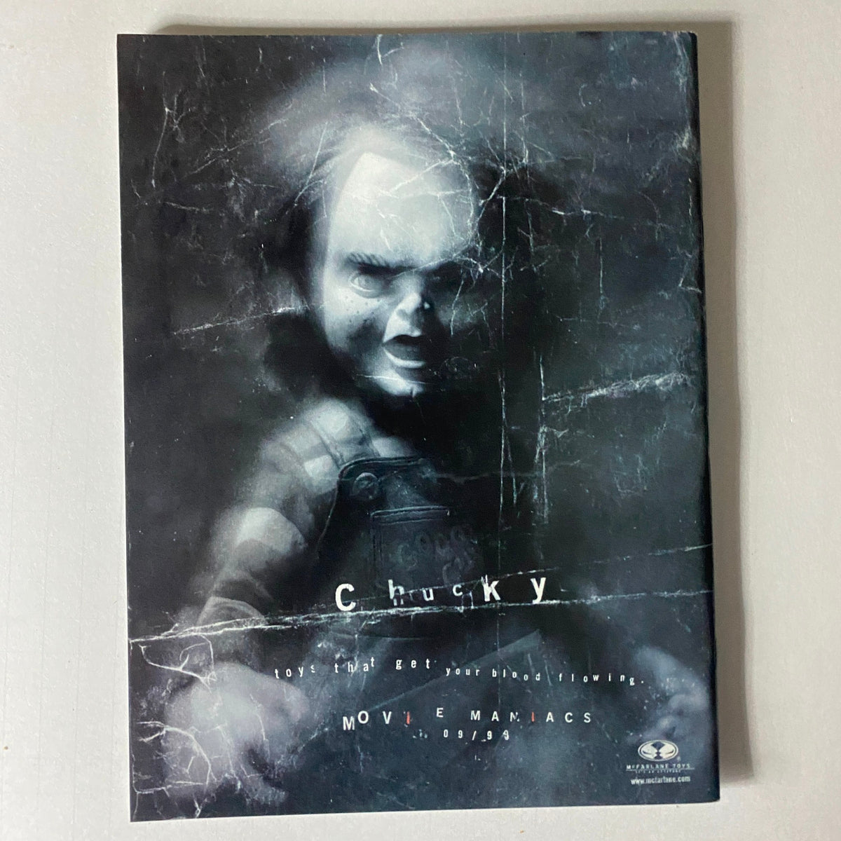 1999 Todd McFarlane Presents Kiss Psycho Circus magazine featuring Chucky's promotional material as part of the Movie Maniacs, enhancing the vintage collectible appeal.
