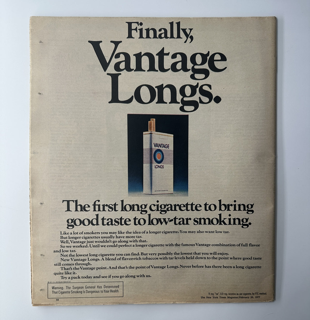 Vintage advertisement for Vantage Longs cigarettes, featuring a pack and the slogan about bringing good taste to low-tar smoking. The ad reads, 'Finally, Vantage Longs. The first long cigarette to bring good taste to low-tar smoking.' This image accompanies The New York Times Magazine from February 20, 1977, featuring Steve Cauthen.