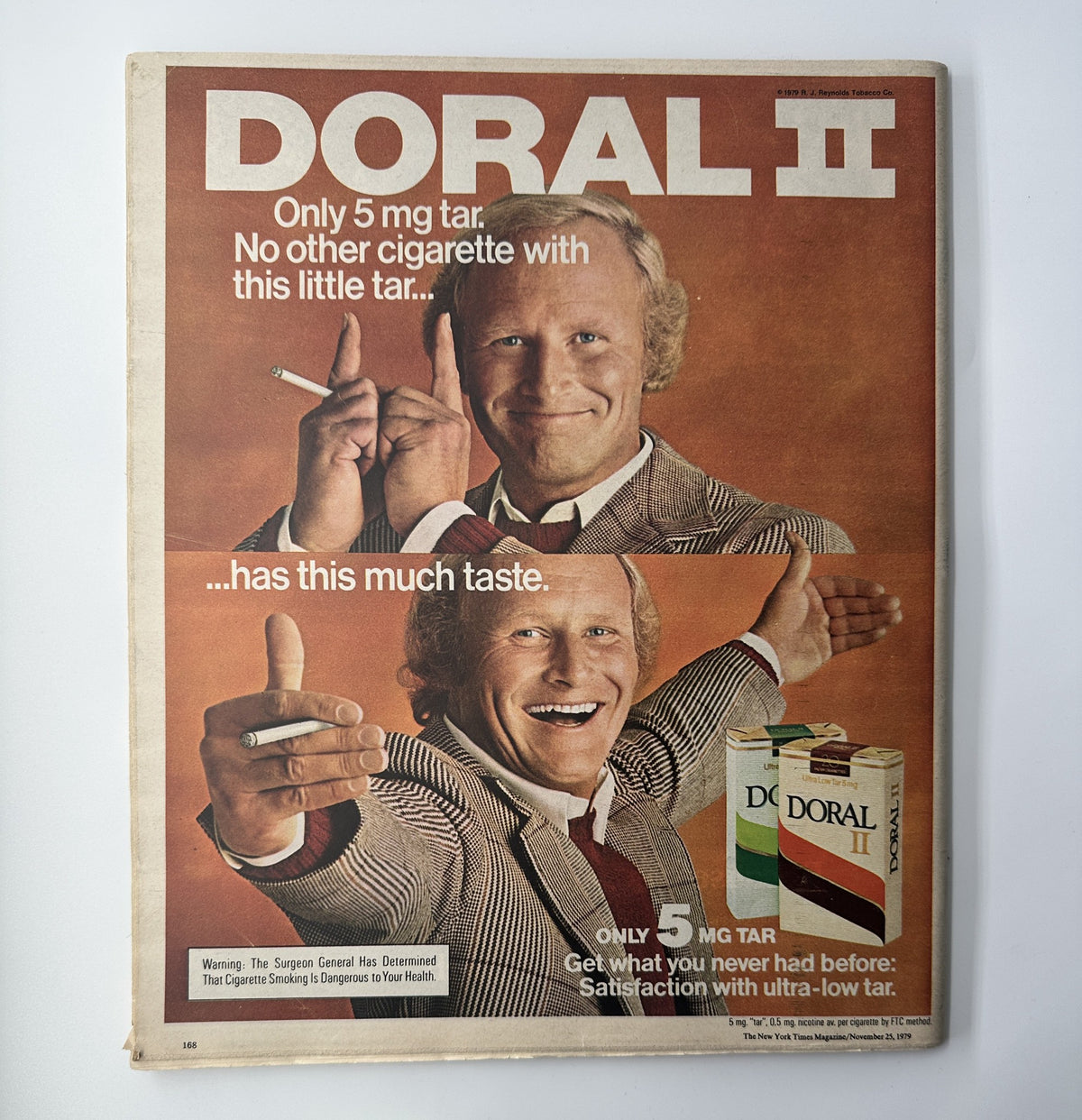 Vintage advertisement for Doral II cigarettes from the November 25, 1979 issue of The New York Times Magazine, featuring a smiling man promoting the low tar brand.