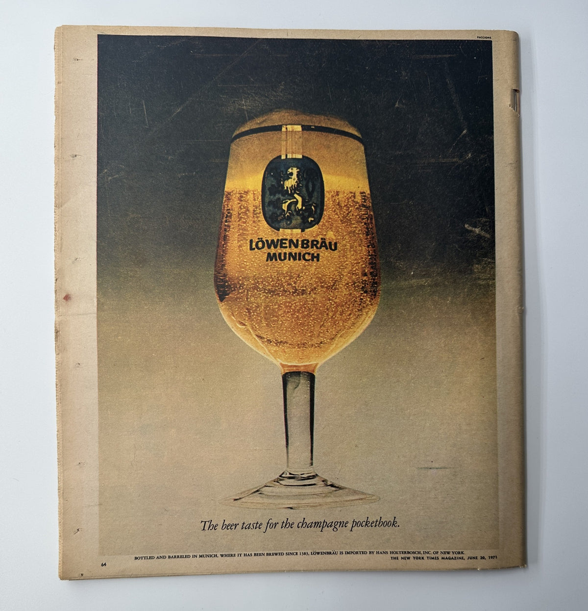 The New York Times Magazine June 20, 1971 cover featuring a depiction of a Löwenbräu Munich beer glass, emphasizing 'The beer taste for the champagne pocketbook,' showcasing vintage advertising aesthetics.