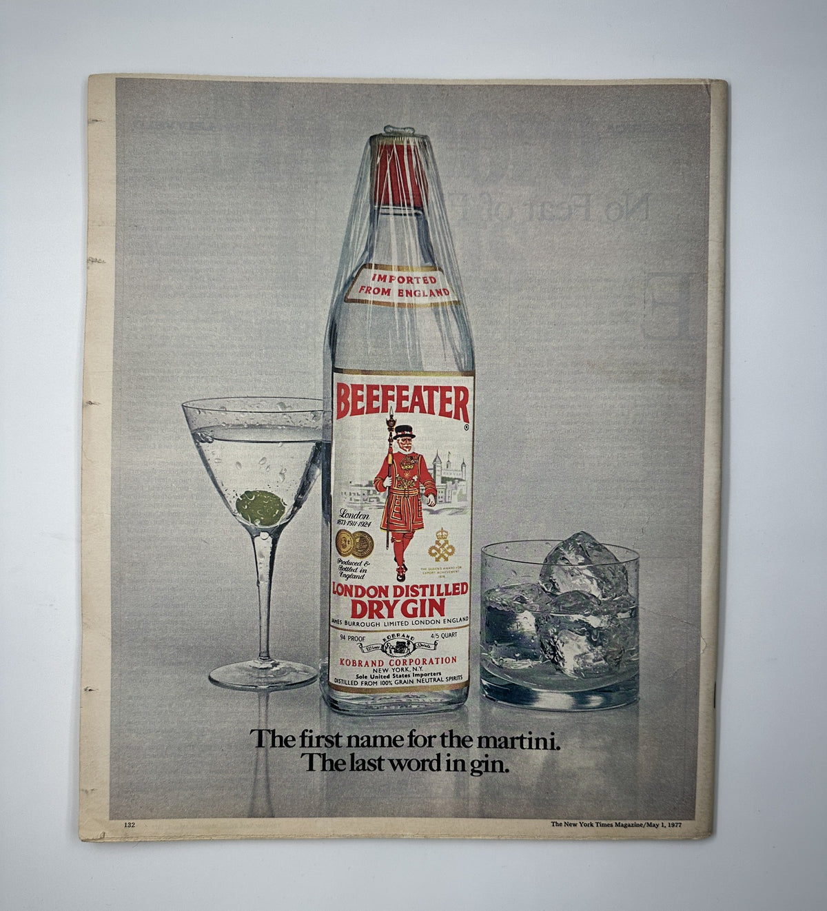 Beefeater Dry Gin advertisement featuring a bottle and a martini glass with ice, from The New York Times Magazine May 1, 1977, titled 'Busted in Mexico Drug Arrests'.