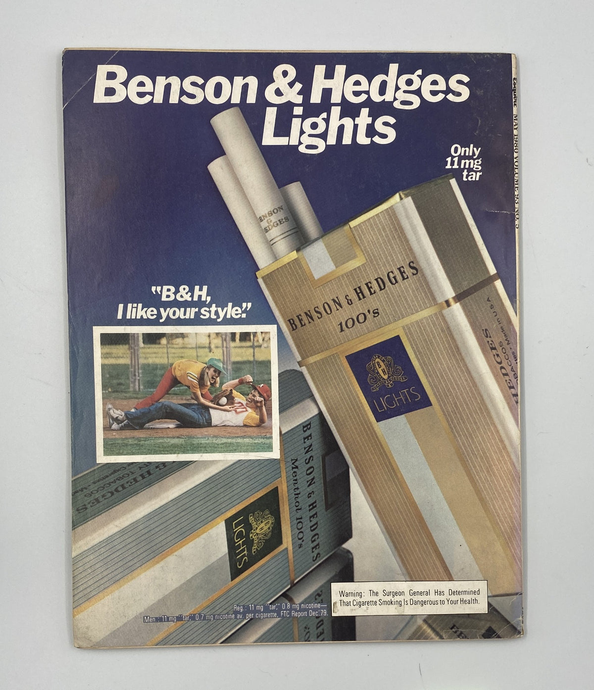 Benson & Hedges Lights advertisement, emphasizing the brand with a visual display of cigarette packages and an outdoor scene.