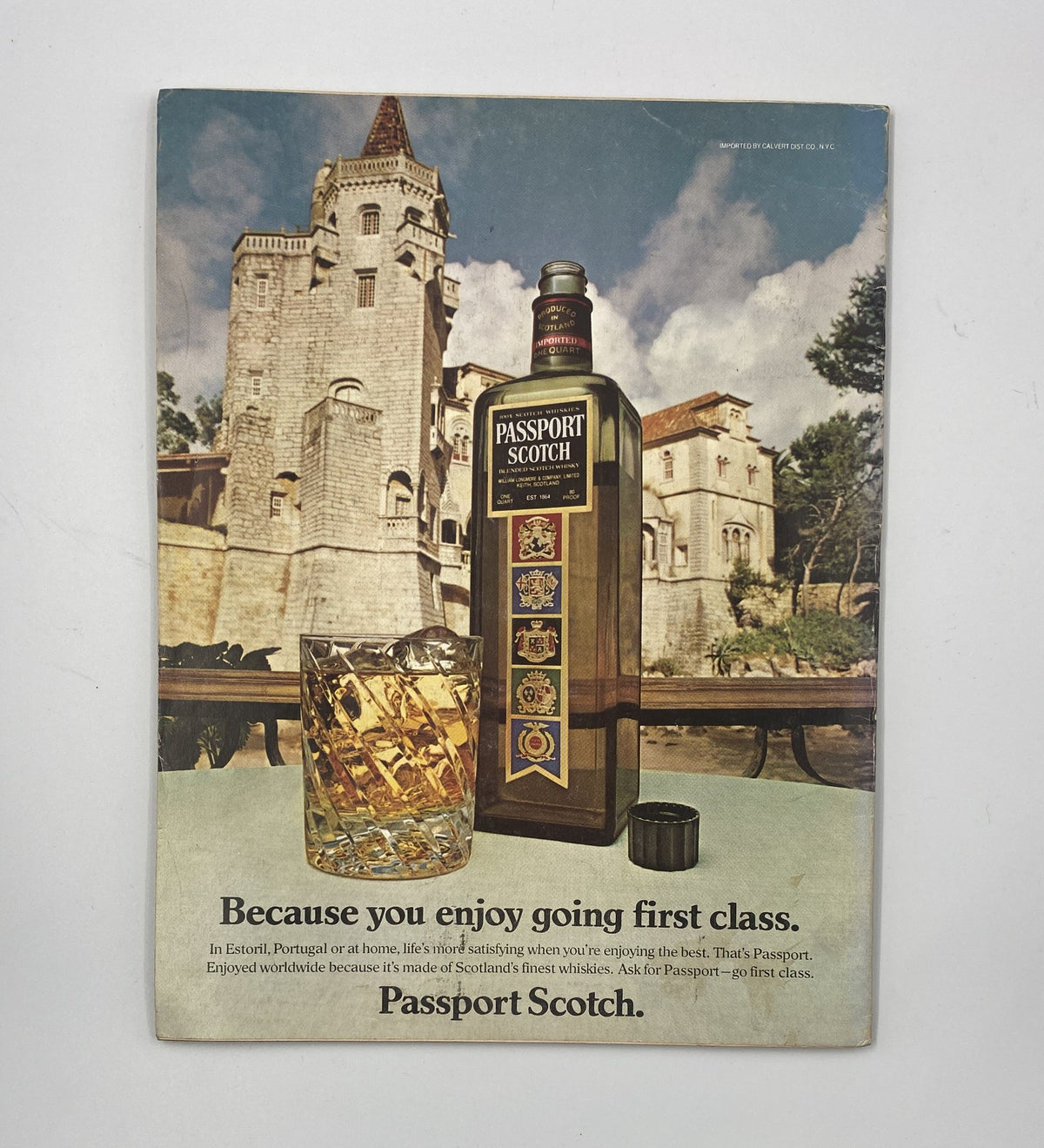 Esquire Magazine August 1980 featuring an advertisement for Passport Scotch. The ad showcases a bottle of Passport Scotch and a glass with whiskey, set against a picturesque background, emphasizing luxury with the tagline, 'Because you enjoy going first class.'