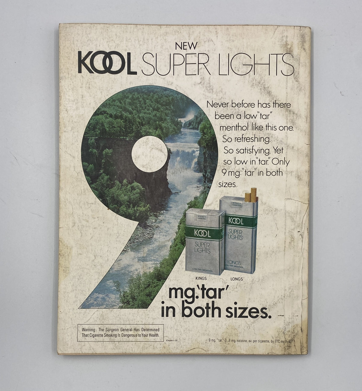 Back cover of Esquire Magazine October 1977 featuring an advertisement for Kool Super Lights Menthol cigarettes with the tagline promoting its low tar content.