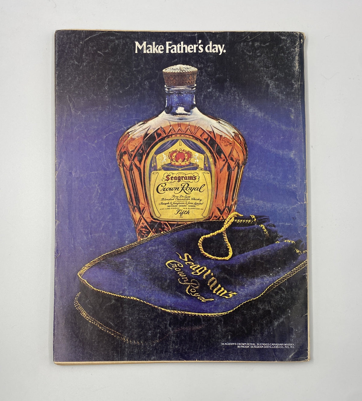 Esquire Magazine June 1977 cover featuring a bottle of Seagram's Crown Royal whiskey against a blue background, promoting Father's Day. The cover includes the title 'Esquire Magazine June 1977 JFK Cover Tom Wicker Frank Frazetta Revenge Issue'.