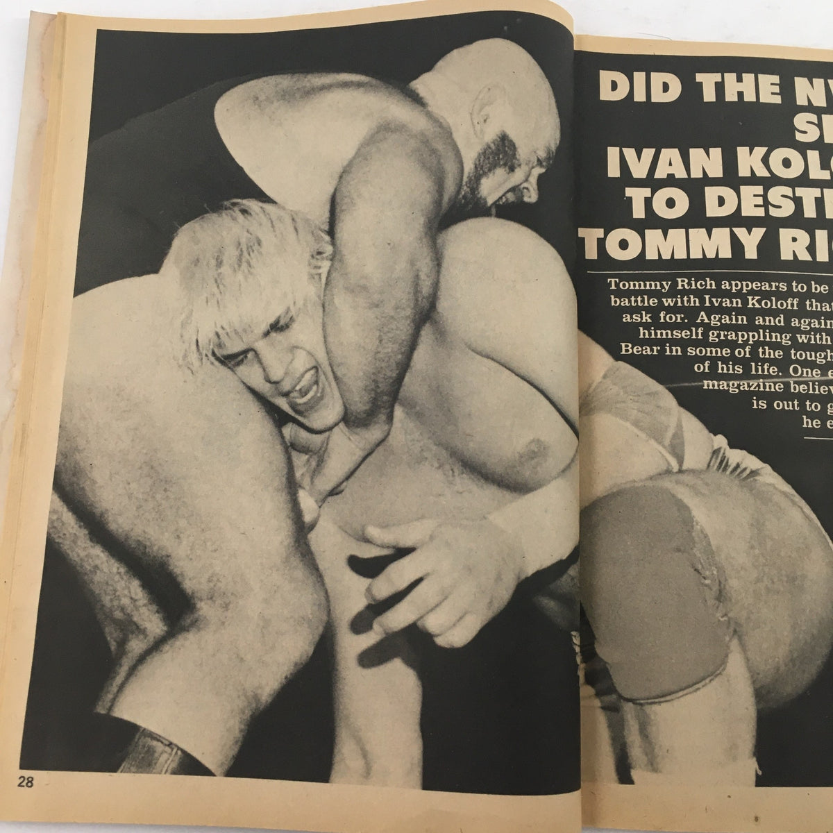 Image of wrestlers Ivan Koloff and Tommy Rich grappling in a match, with a bold headline related to the storyline, from The Wrestler Magazine May 1982.