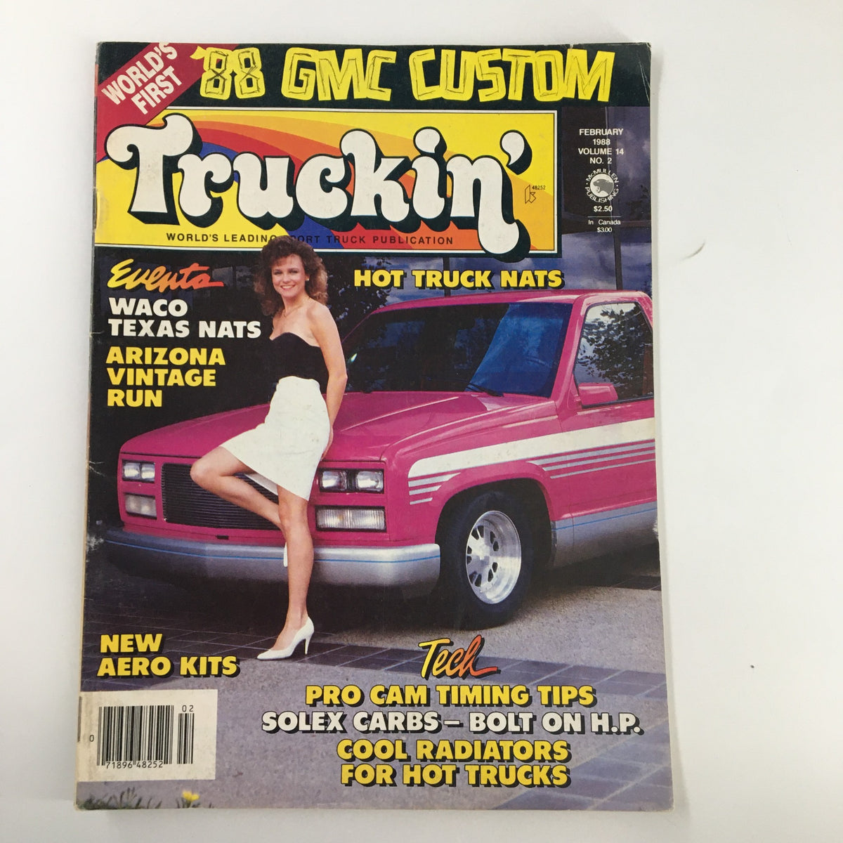 Cover of VTG Truckin' Magazine February 1988 featuring the Arizona Vintage Run Events, with a pink GMC truck in the background and a model dressed in white.
