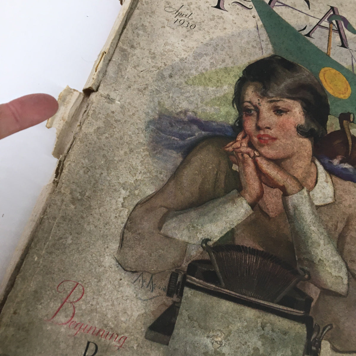 Cover of VTG McCall's Magazine April 1930 featuring a vintage illustration of a woman with a typewriter, highlighting the title 'The Fifth Horseman' by Robert Chambers.