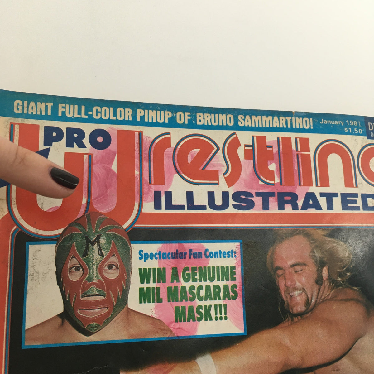 Close up of the cover of Pro Wrestling Illustrated Magazine January 1981, showing details of the Mil Mascaras mask fan contest and Hulk Hogan.