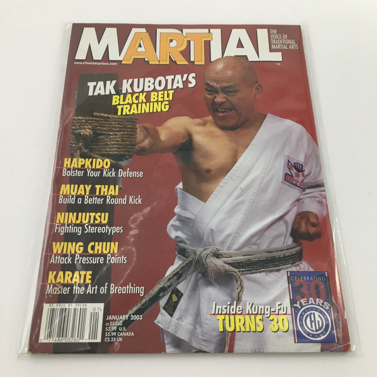 Cover of Martial Art Magazine January 2003 featuring Tak Kubota on black belt training, showcasing various martial arts including Hapkido, Muay Thai, Ninjutsu, Wing Chun, and Karate.