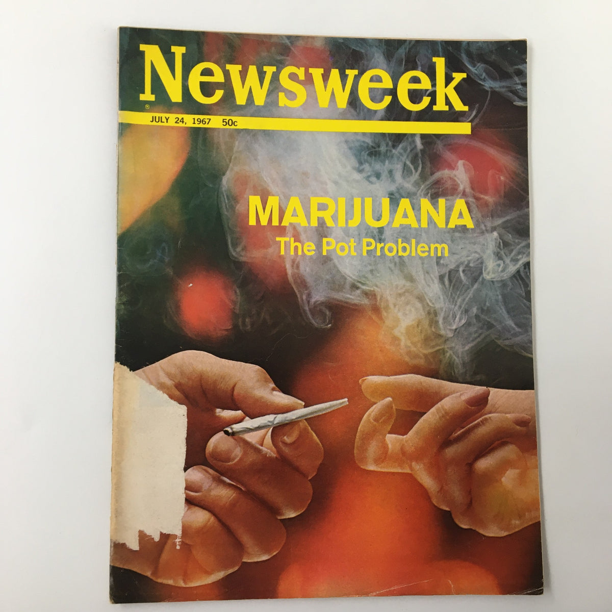 Vintage Newsweek magazine cover from July 24, 1967, featuring the title 'Marijuana: The Pot Problem,' showcasing hands holding a joint amidst a background of smoke.