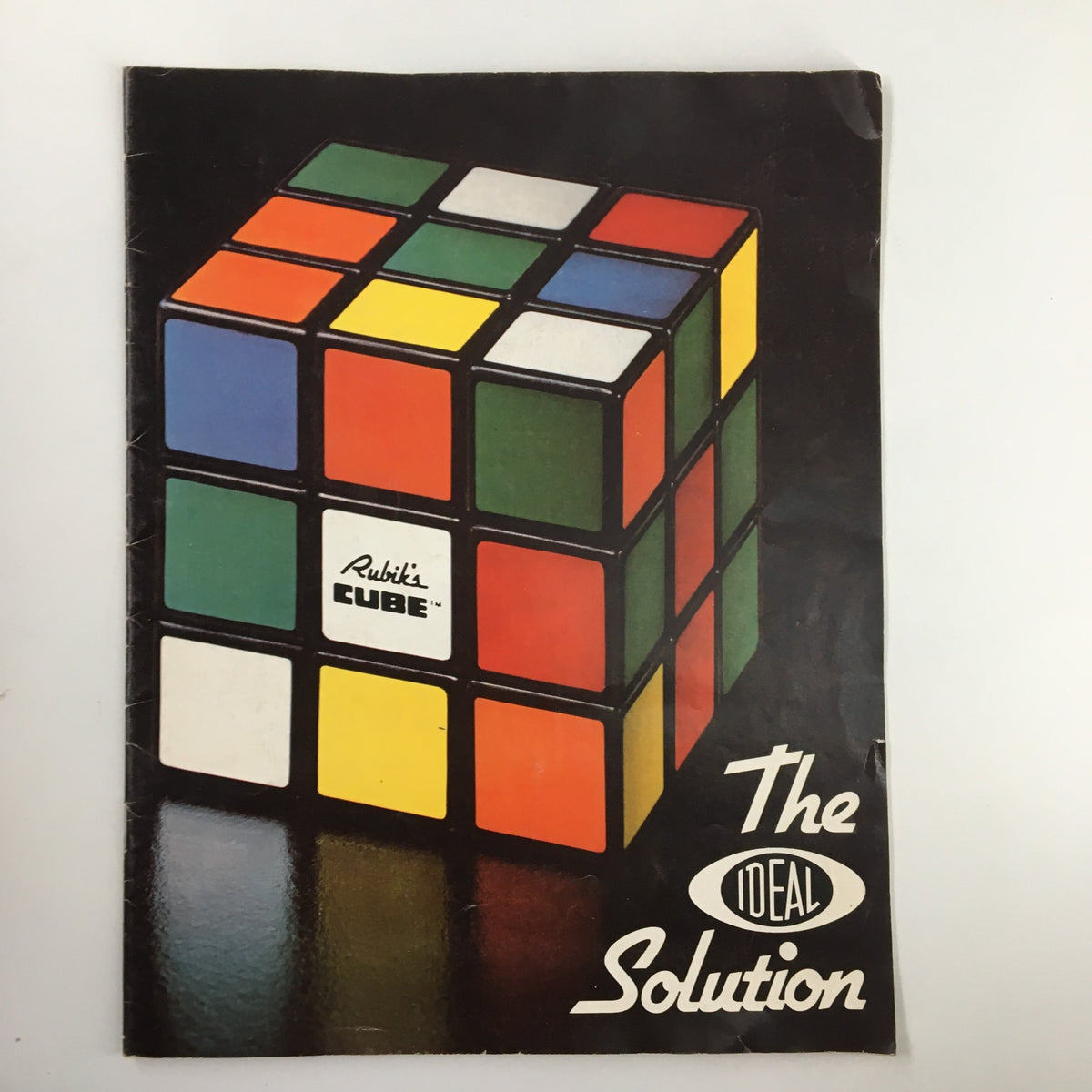 1981 Rubik's Cube: The Ideal Solution magazine cover featuring the colorful cube design and title, showcasing a vintage collectible from Ideal Toy Corporation.