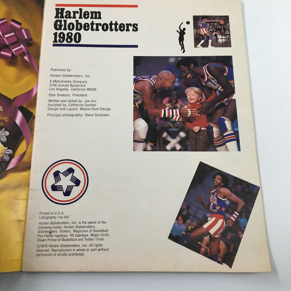 Back cover of the 1980 Harlem Globetrotters The Trotters on Tour showcasing team members and images from performances. The publication includes credits and descriptions related to the Harlem Globetrotters.