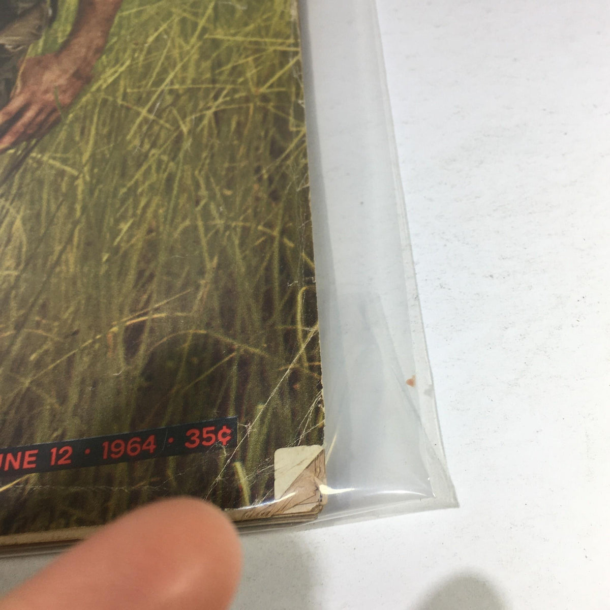 Detailed close-up of the bottom right corner of the VTG Life Magazine cover from June 12, 1964, showcasing the date 'June 12 1964' and the price '35¢'. The image highlights the vintage appeal and wear of the magazine.