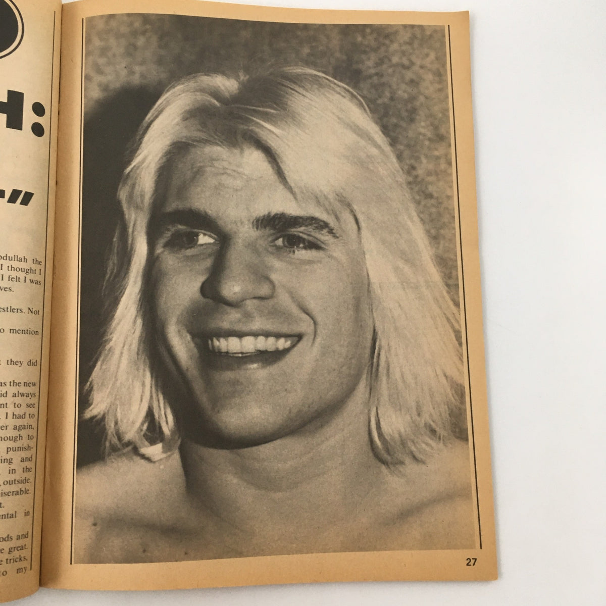 Image of a smiling young wrestler featured in Inside Wrestling Magazine March 1980, illustrating the era's wrestling personalities.
