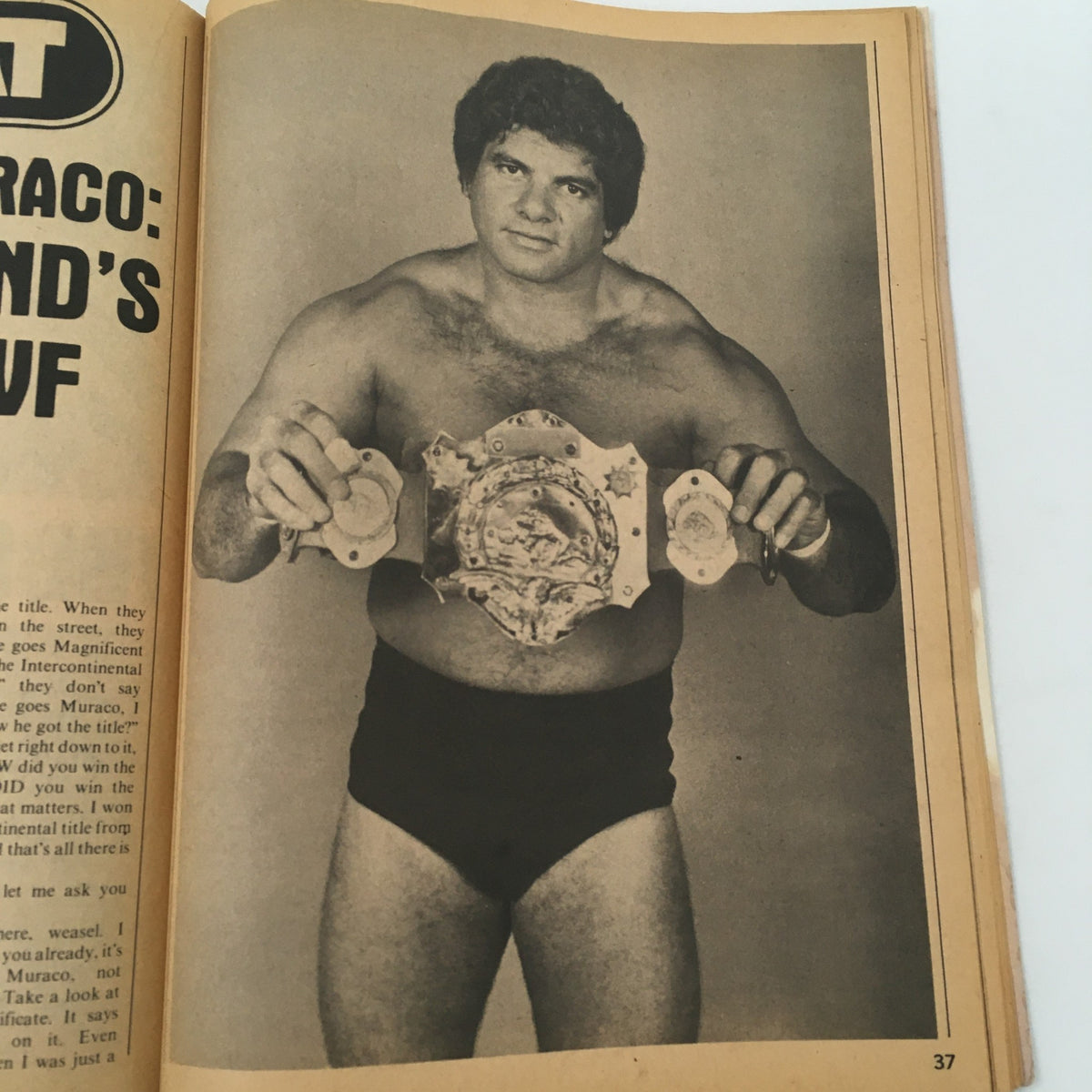 Inside Wrestling Magazine November 1981 displaying a vintage black and white image of a victorious wrestler with a championship belt, representing wrestling's rich history.