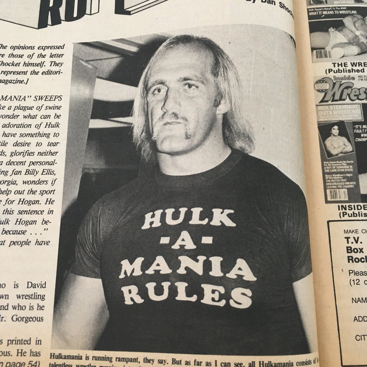 Hulk Hogan featured in Pro Wrestling Illustrated Magazine April 1985, wearing a 'HULK-A-MANIA RULES' t-shirt.