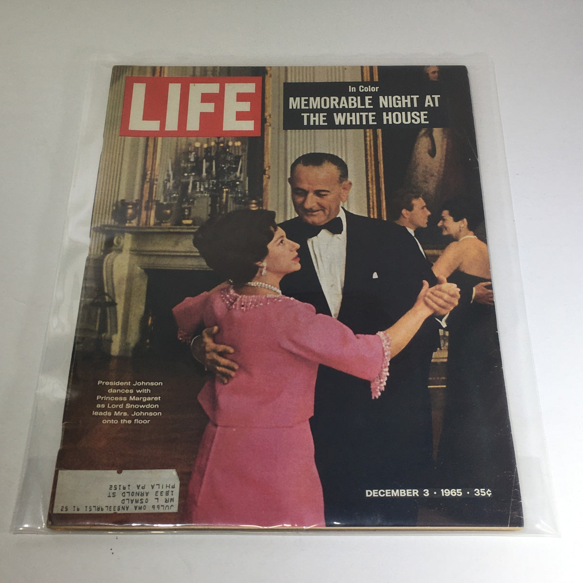 Cover of Vintage Life Magazine, December 3, 1965, featuring President Johnson dancing with Princess Margaret, titled 'Memorable Night at the White House'. The image captures an iconic moment in history with President Johnson in formal attire and Princess Margaret in a pink gown, showcasing a glamorous evening.
