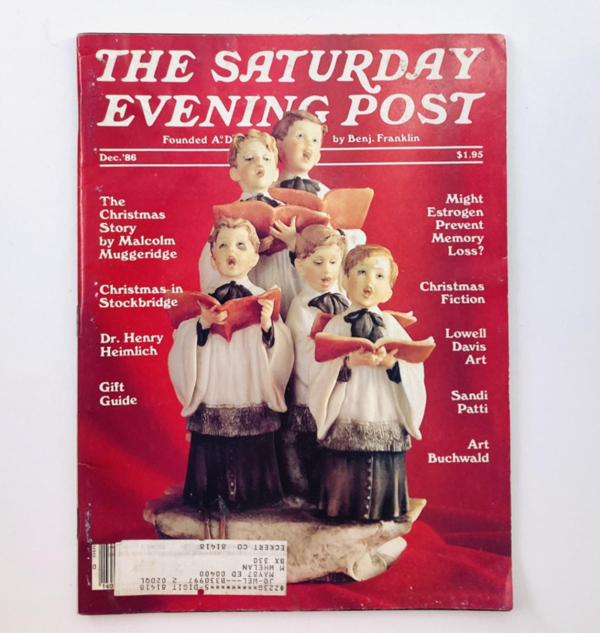 Saturday Evening Post Magazine December 1986 cover featuring a choir of children singing, showcasing an iconic design by photographer Garry Chilluffo.