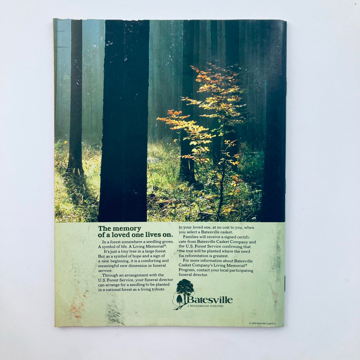 Back cover of the Saturday Evening Post magazine from May 1988, featuring a serene forest scene with tall trees and a vibrant autumn leaf. The text reads 'The memory of a loved one lives on' promoting the Batesville Casket Company's Living Memorial program.