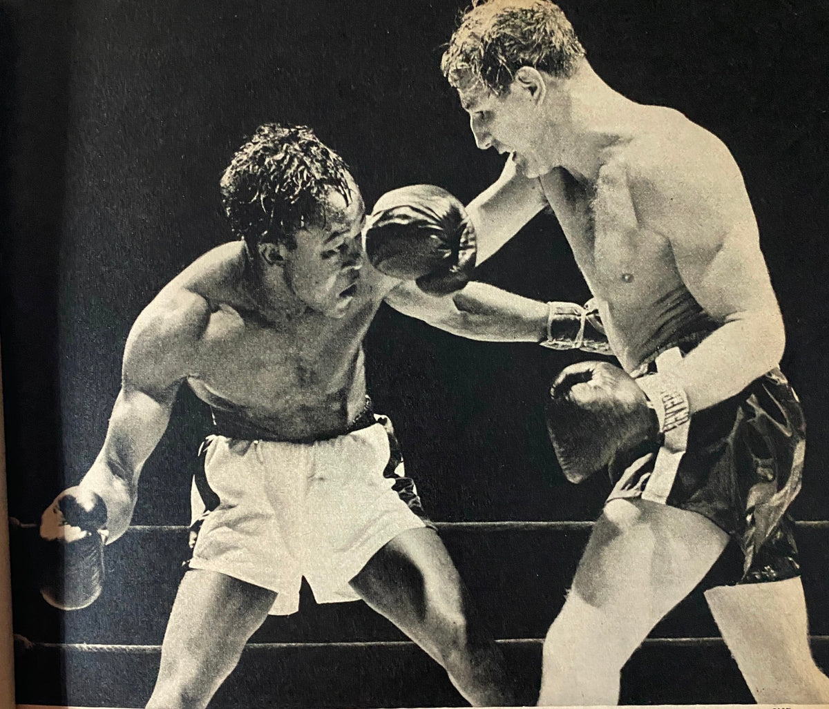 Classic boxing match illustration from Sport Magazine September 1953, representing the competitive spirit of the sport during the era.
