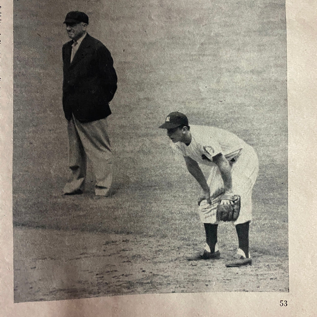 Inside Baseball Magazine October 1952 page featuring a photo of an umpire and a player during a baseball game.