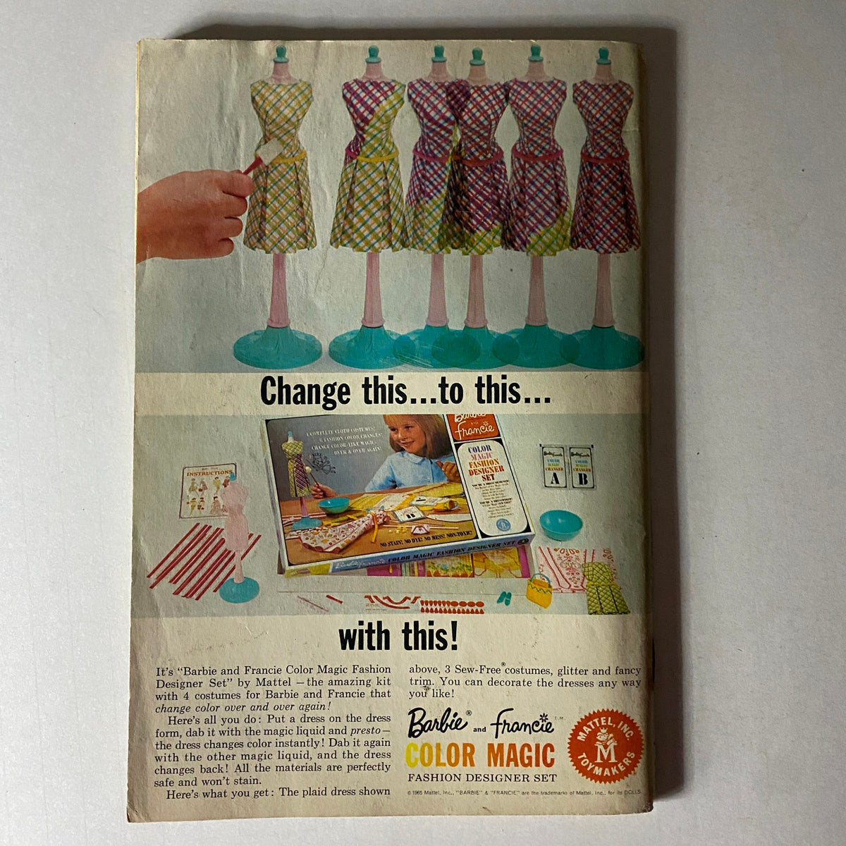 Back cover advertisement of Jack and Jill Story Magazine June 1966 featuring a Barbie and Francie Color Magic Fashion Designer Set. The image shows a child playing with the dress design kit, illustrating its creative potential.