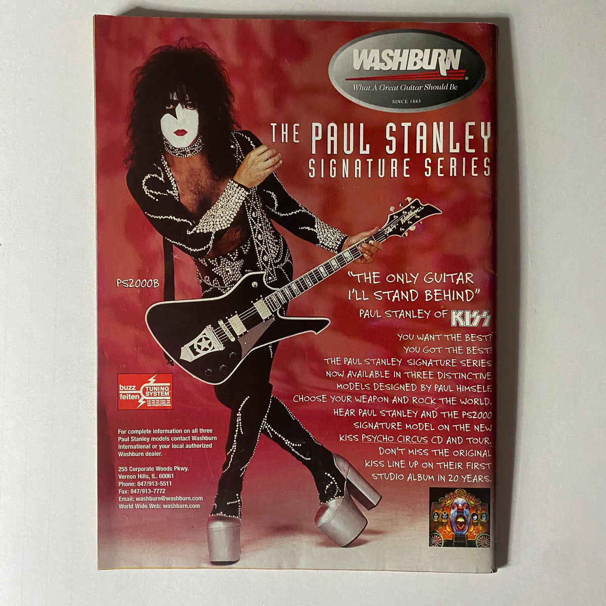 Promotional advertisement from Metal Edge Magazine featuring Paul Stanley of KISS, showcasing the Paul Stanley Signature Series guitar by Washburn. The ad emphasizes Stanley's endorsement with eye-catching design and vibrant colors, making it a notable piece for collectors of classic rock memorabilia.