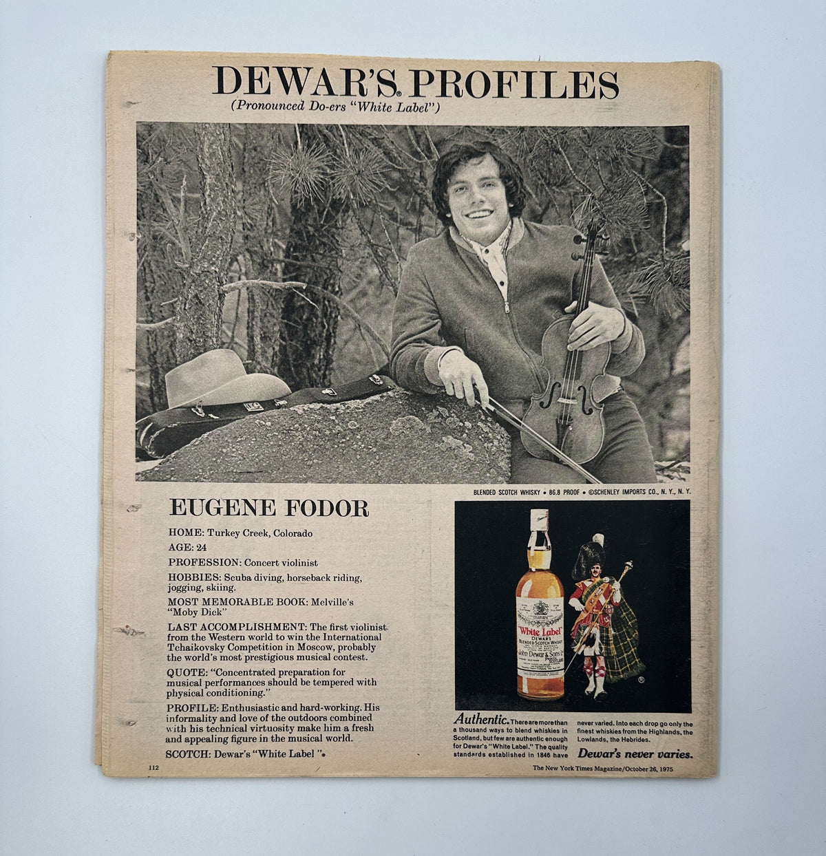 The New York Times Magazine October 26, 1975 back cover, highlighting Dewar's Profiles with Eugene Fodor, a renowned violinist, and an advertisement for Dewar's White Label whiskey.