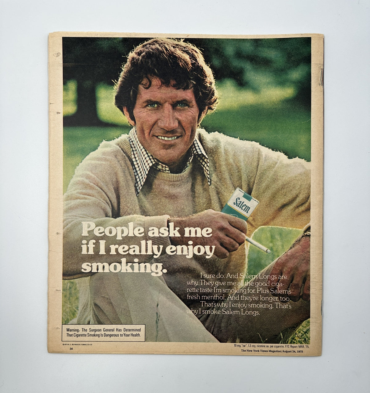 Vintage advertisement for Salem cigarettes featured in The New York Times Magazine August 24, 1975. The image shows a man with short dark hair smiling, holding a pack of Salem cigarettes, with the text 'People ask me if I really enjoy smoking.' The magazine cover also prominently displays 'The New York Times Magazine August 24, 1975 Jerry Brown Politics Cover VG.'