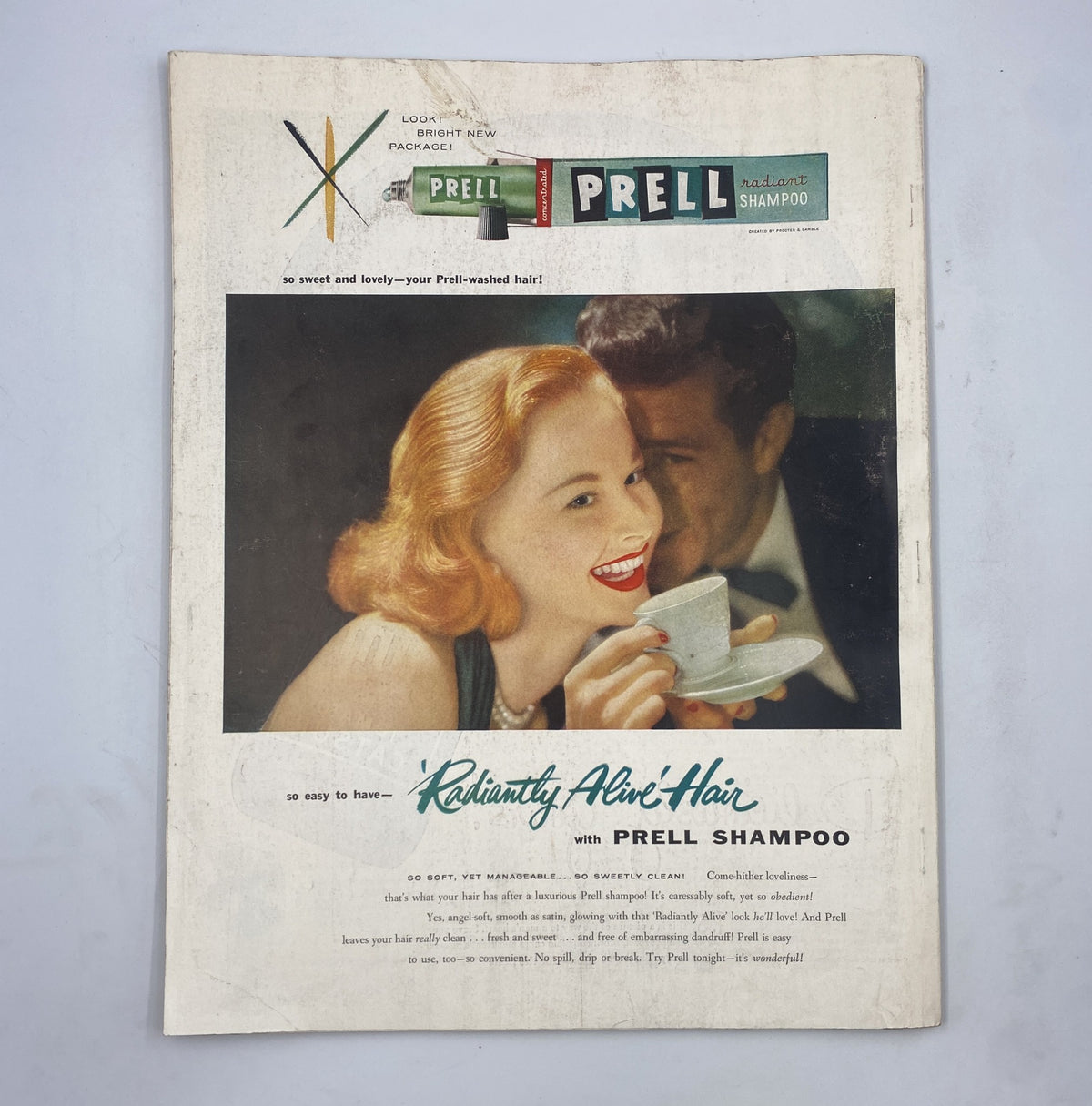 Advertisement page for Prell Shampoo in the Woman’s Home Companion Magazine, November 1954. The advertisement highlights the benefits of using Prell for beautiful hair.