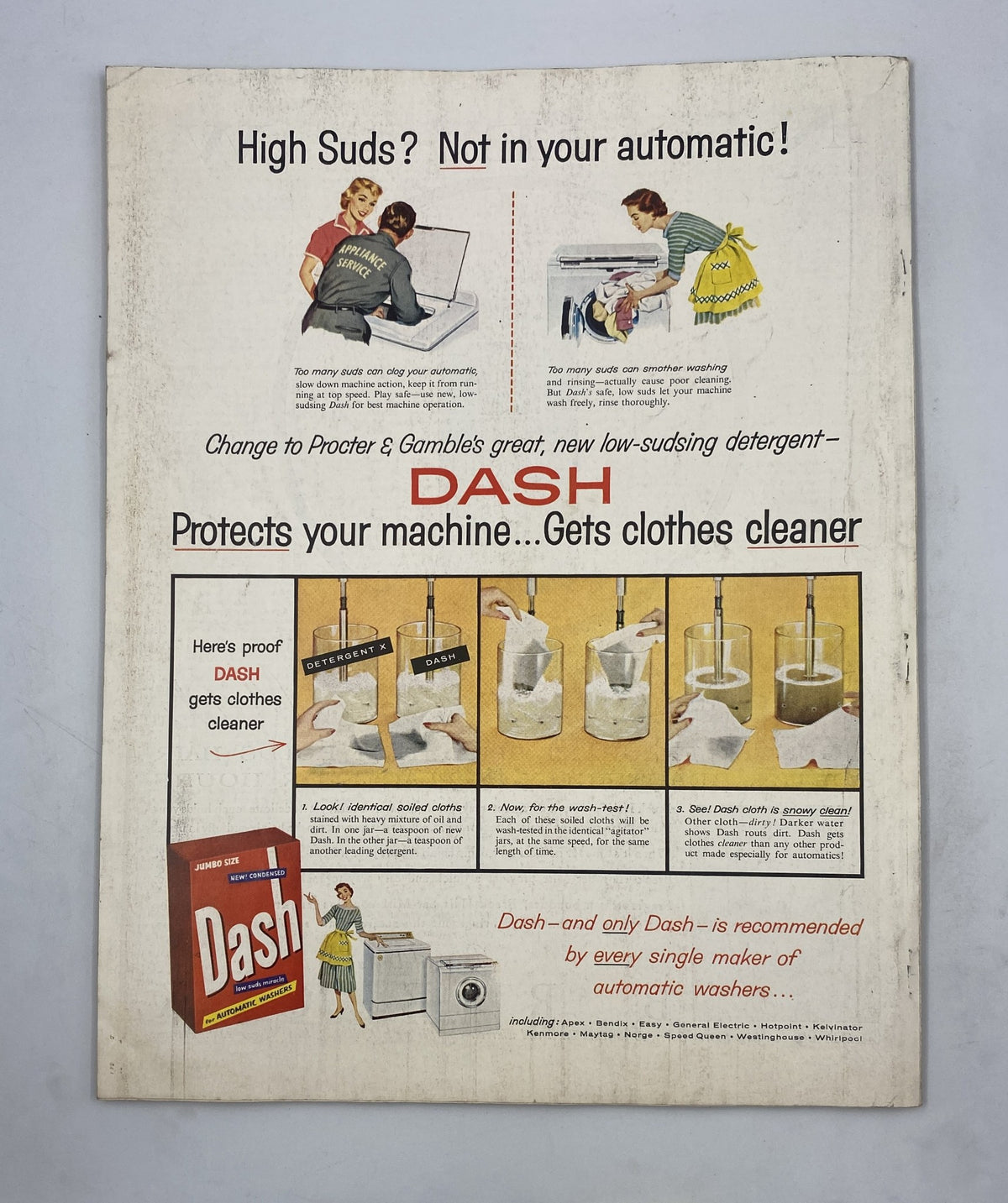 Back cover of Woman’s Home Companion Magazine July 1956 advertising Dash laundry detergent, illustrating its effectiveness for automatic washers alongside other promotional graphics related to laundry care.