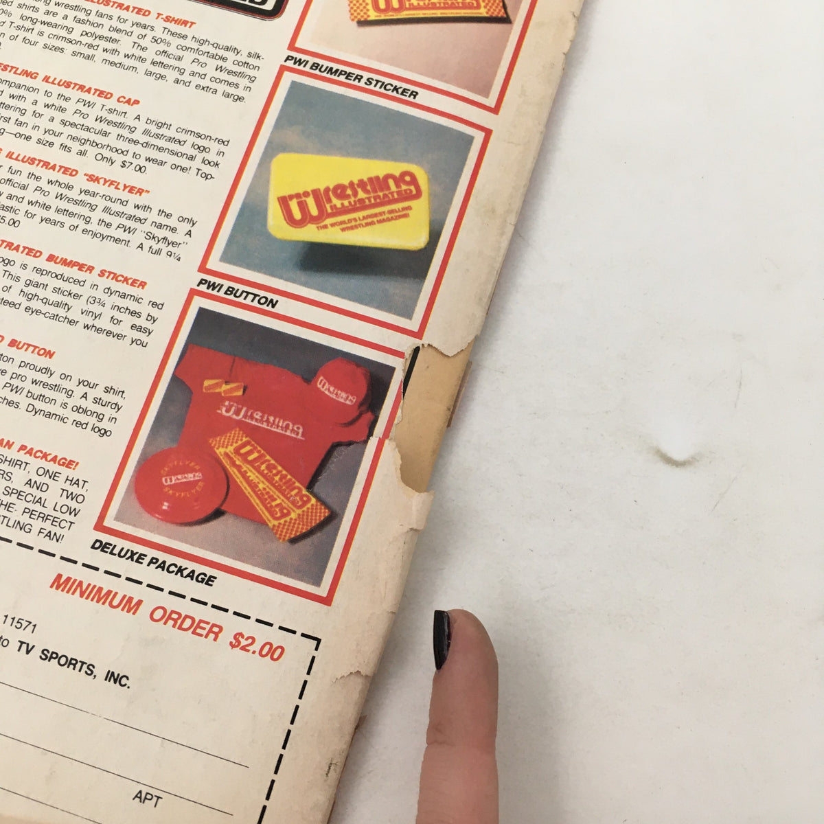 Pro Wrestling Illustrated Magazine August 1985 showing the back cover with various merchandise advertisements including T-shirts, buttons, and bumper stickers.
