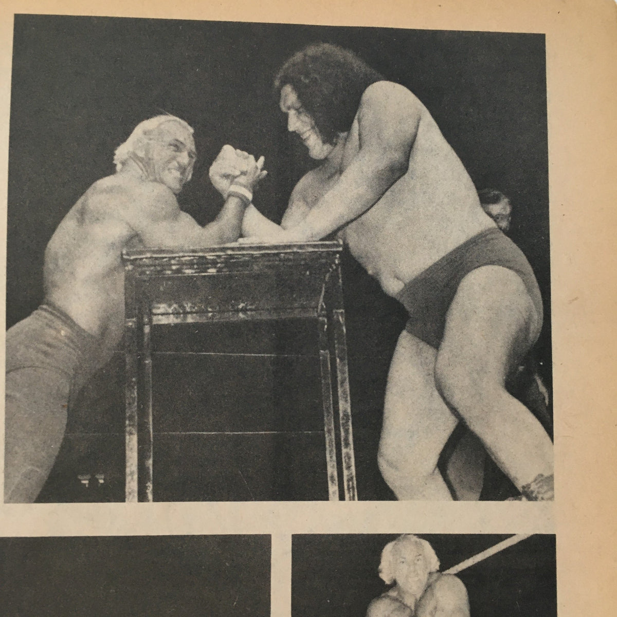 Dramatic moment from Wrestling Superstars Magazine Spring 1980 featuring an arm wrestling match between Ken Patera and Andre The Giant.