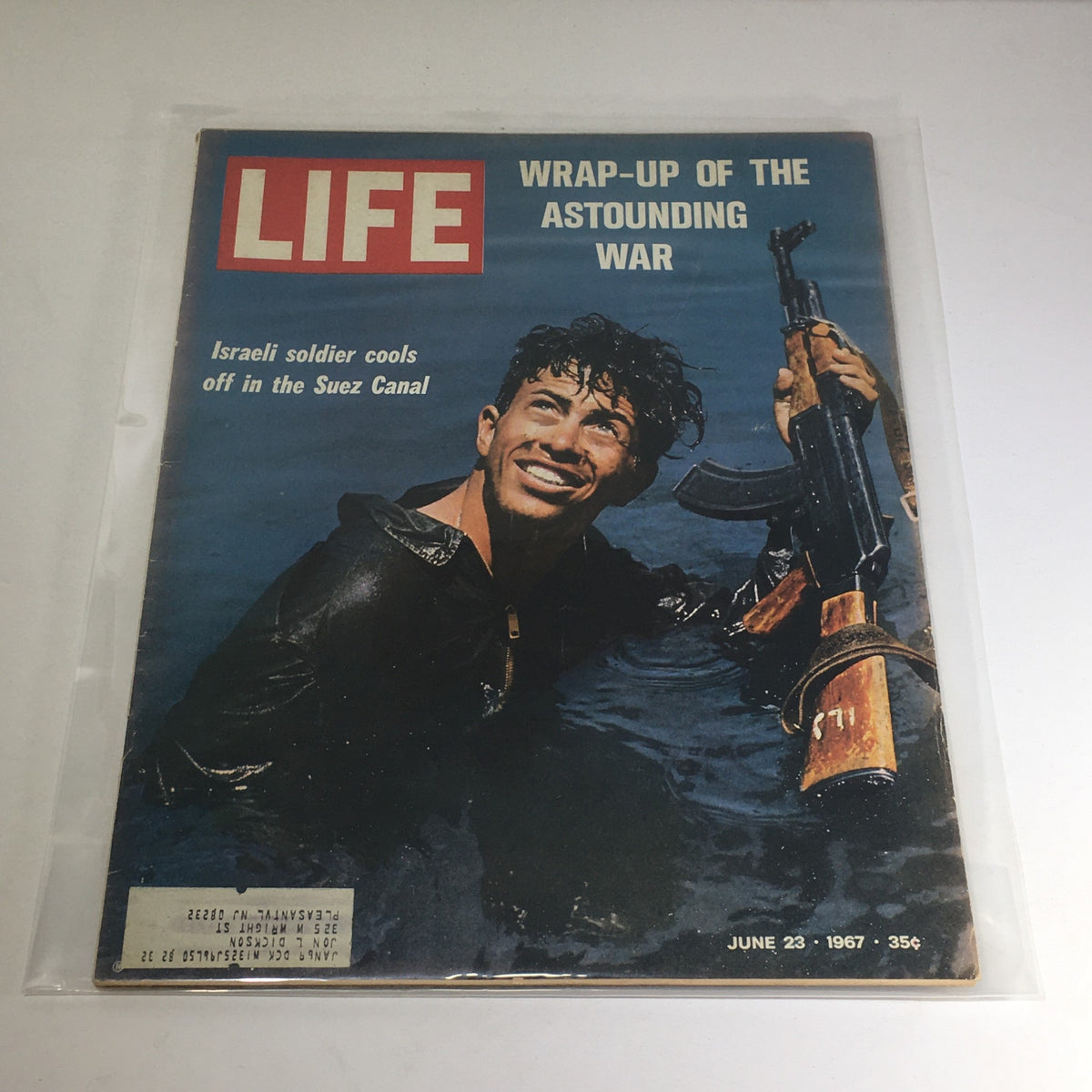 Cover of VTG Life Magazine: June 23 1967, featuring an Israeli soldier cooling off in the Suez Canal, showcasing the Wrap-Up of the Astounding War.