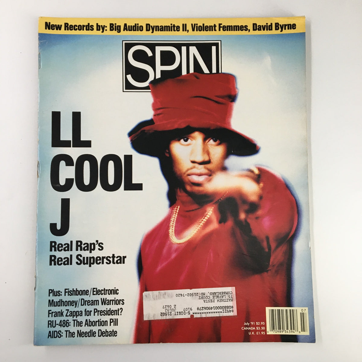 Cover of Spin Magazine July 1991, Volume 7, Number 4 featuring LL Cool J, titled 'Real Rap's Real Superstar', showcasing an image of LL Cool J in a red outfit and hat.