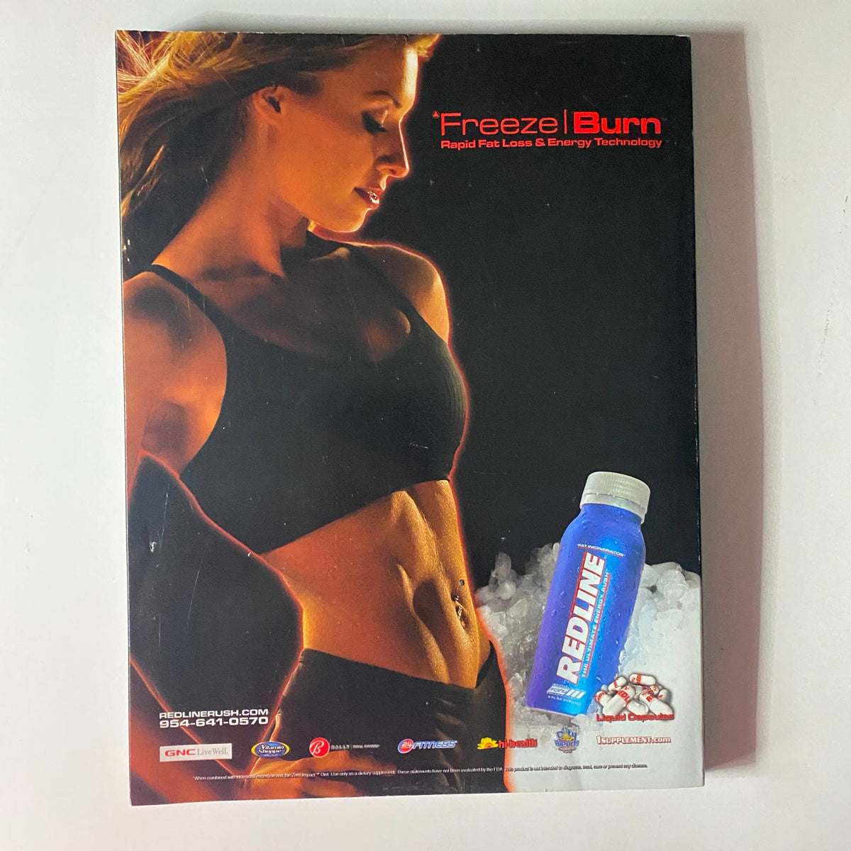 Back cover of Flex Magazine August 2006 Vol 24, Num 6 featuring an advertisement for Redline Freeze Burn, promoting fat loss and energy technology.
