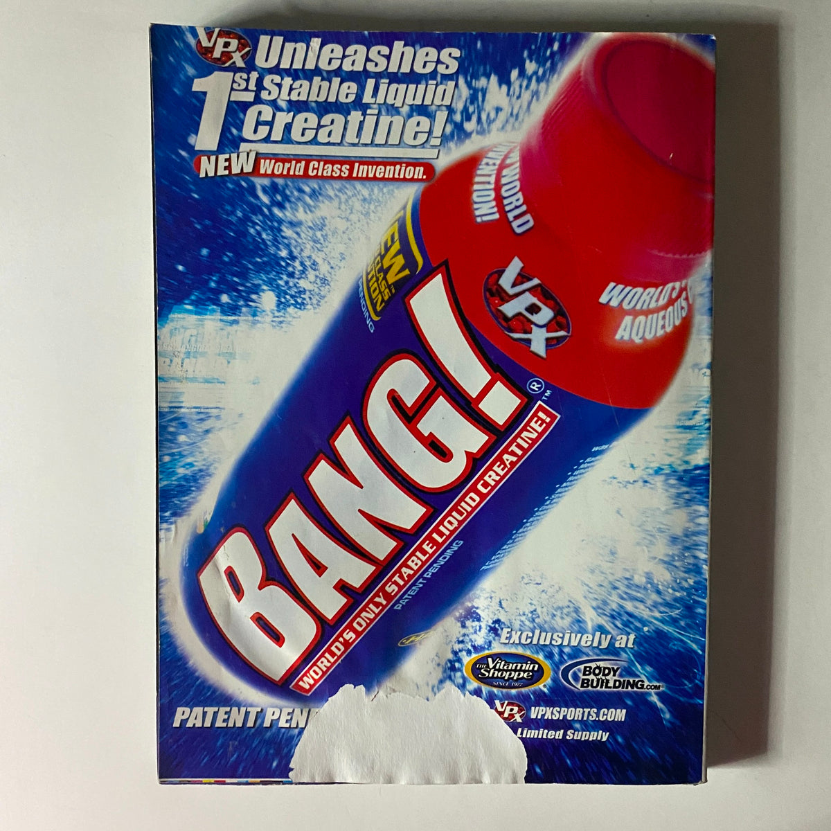 Packaging of Bang! liquid creatine, featured in Flex Magazine September 2008 Vol 26, Num 7 as a cutting-edge fitness supplement.